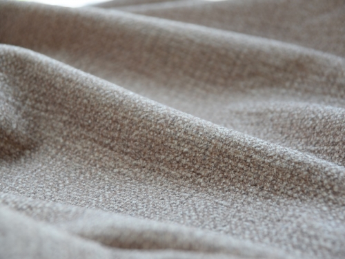 How much upholstery fabric is needed to make a sofa?